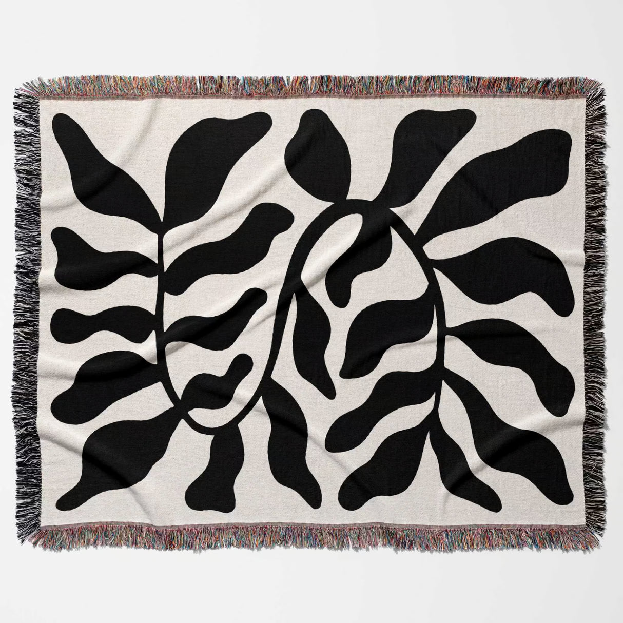Black leaf Matisse throw blanket horizontally flat on a white background