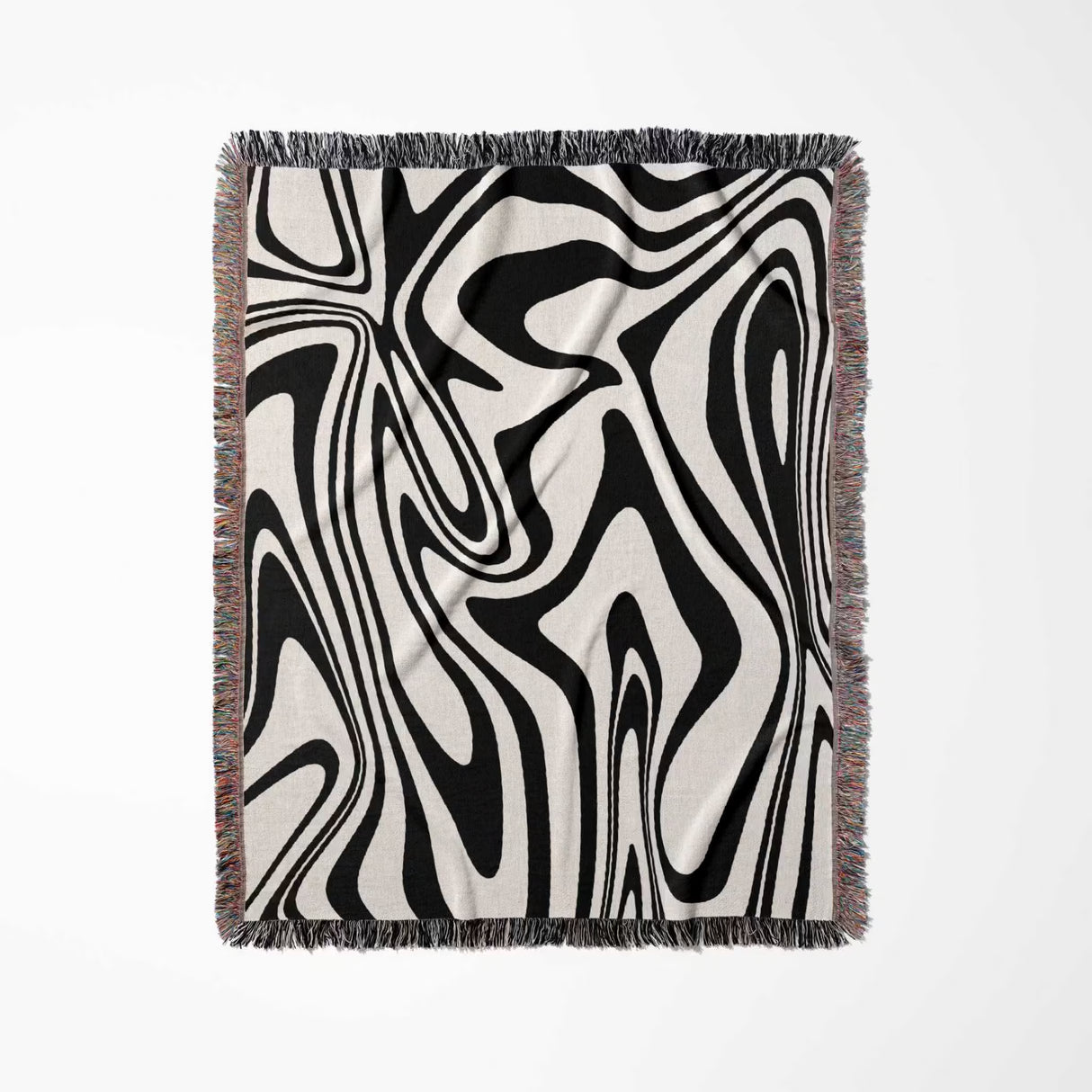 Abstract patterned black and white marble woven throw blanket with black and white design on a light gray background