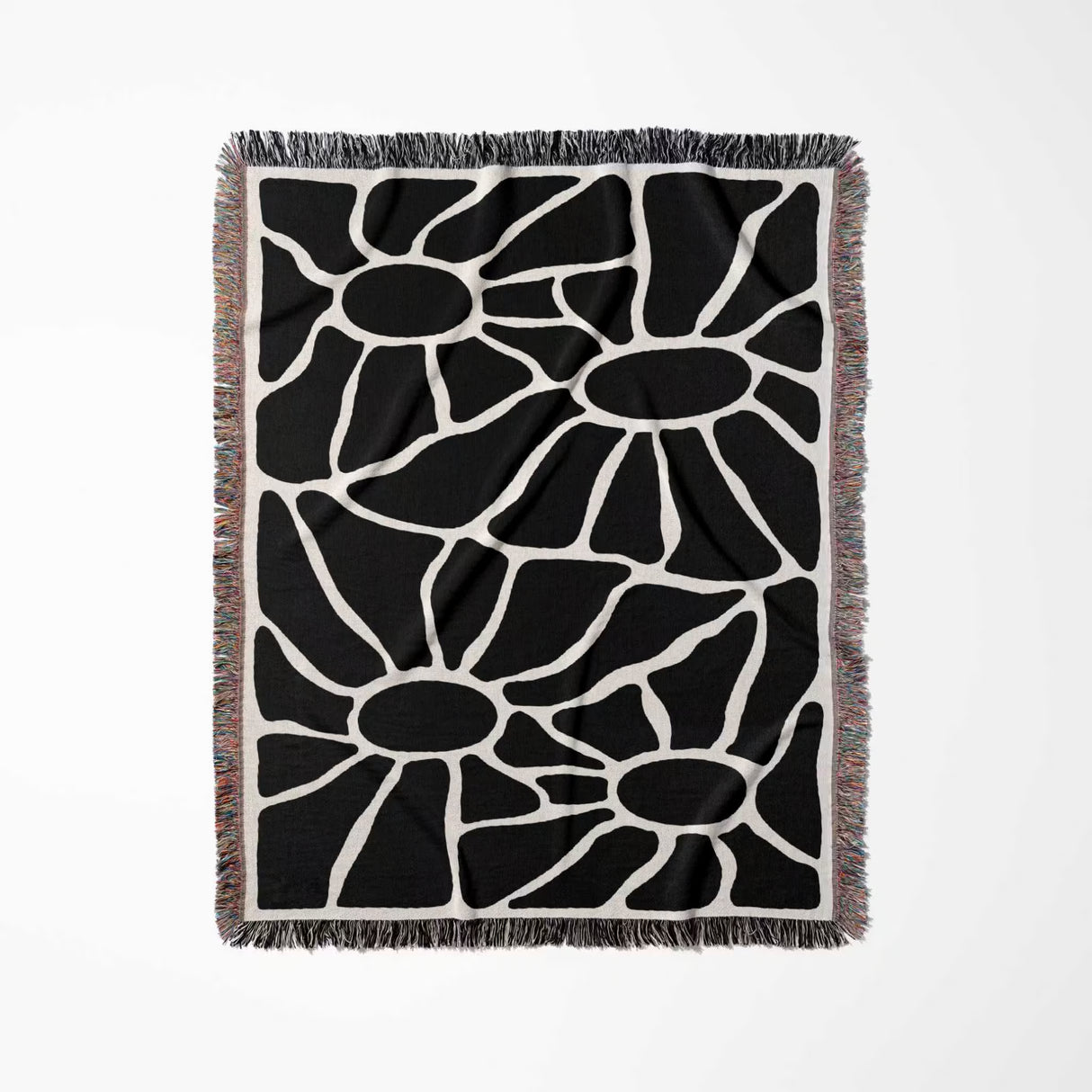Black and white Matisse tapestry throw blanket for couch with fringe on a white background