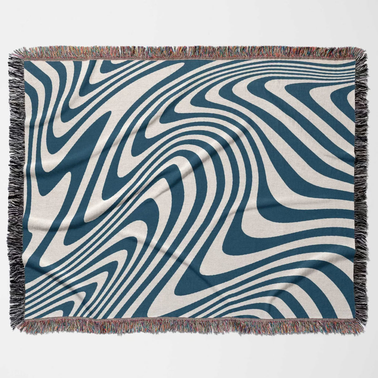 Blue cotton modern decorative woven throw blanket with blue and white abstract pattern on a plain background