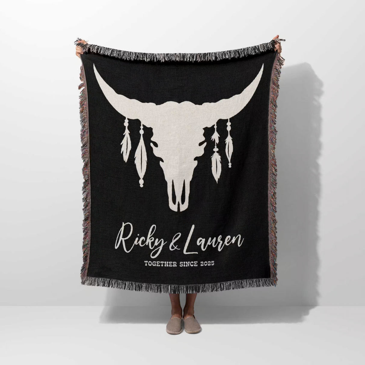 Bull skull boho wedding 2nd anniversary gift woven throw blanket with white bull skull design and text 'Ricky & Lauren Together Since 2023' on a white background
