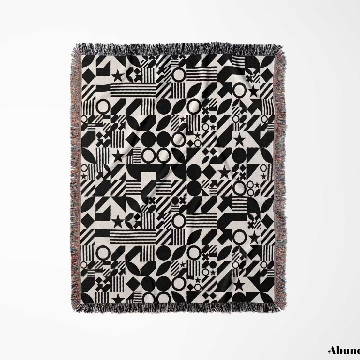 Black and white classical checker board pattern woven blanket throw flat lay on a white background.
