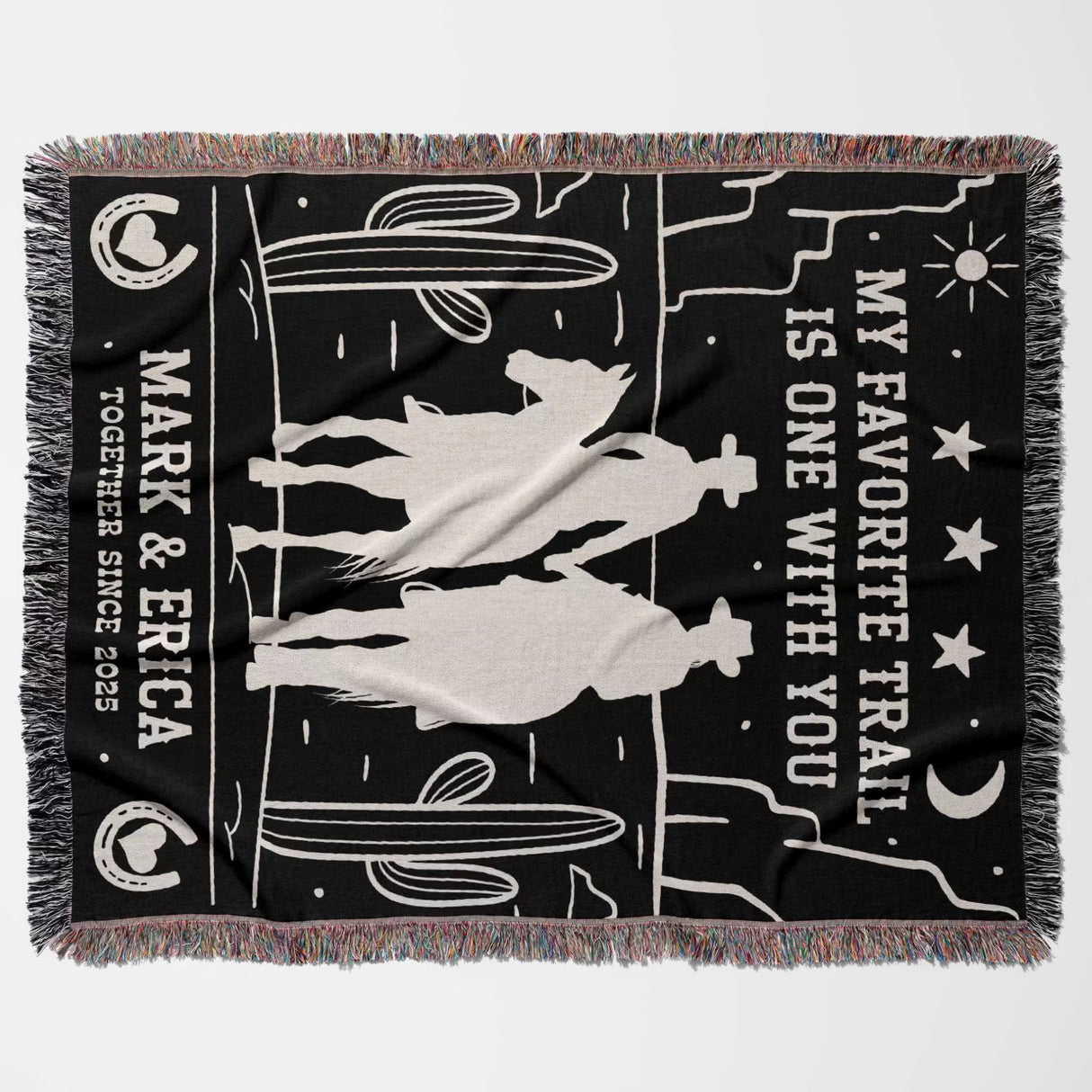 Cowboy and cowgirl couple 2nd anniversary gift woven throw blanket flat lay with horse design and text on a black background