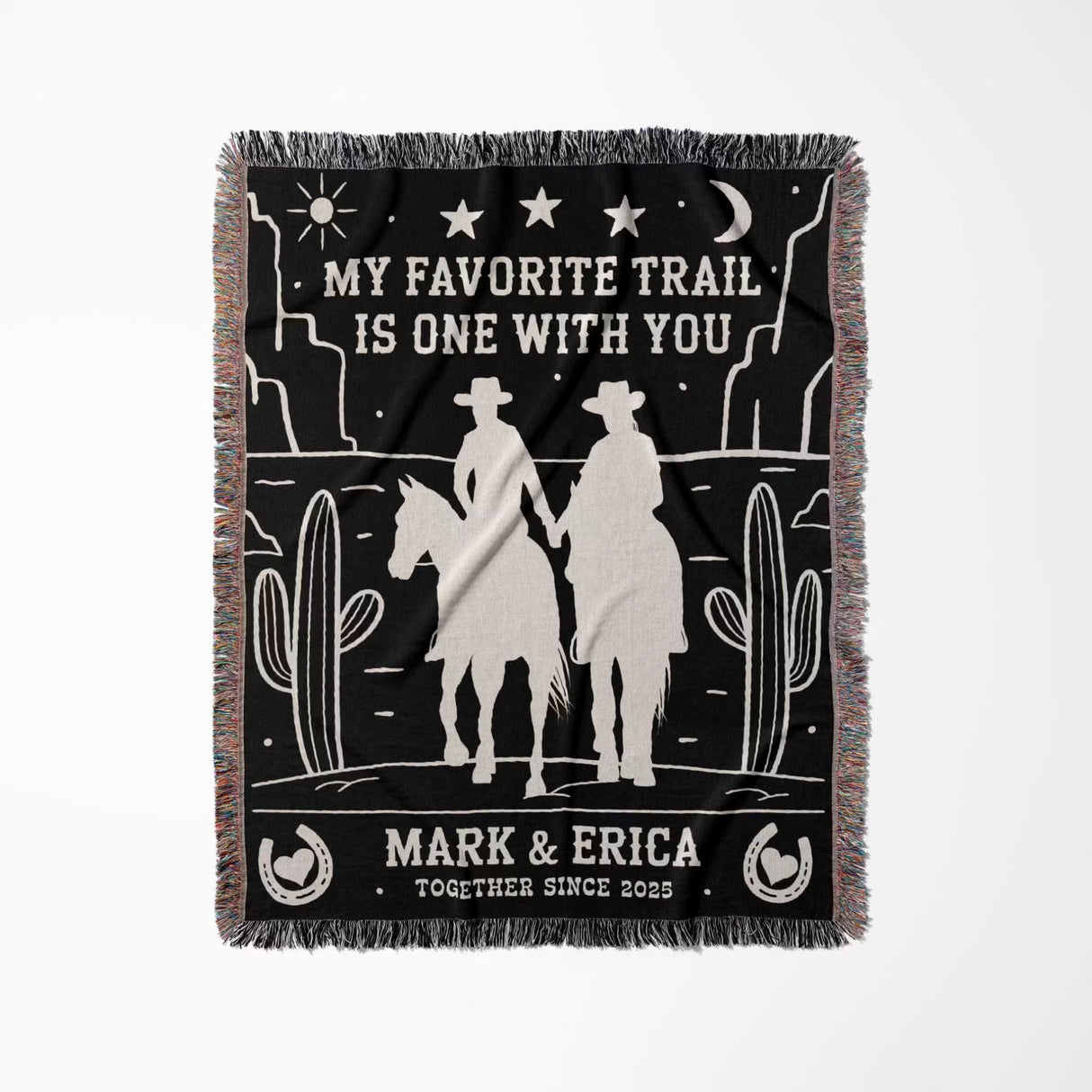 Cowboy and cowgirl couple 2nd anniversary gift woven throw blanket full view with western desert scene design, text, and fringes on a white background