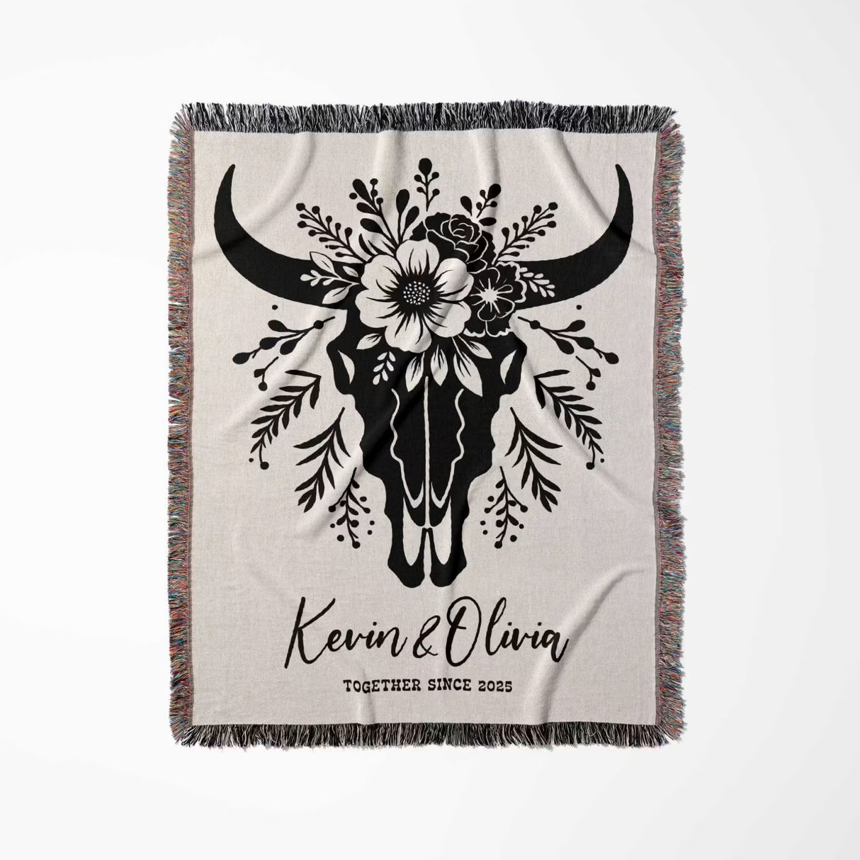 Floral cow skull cotton anniversary gift woven throw blanket full view with bull skull design and personalized text on a white background