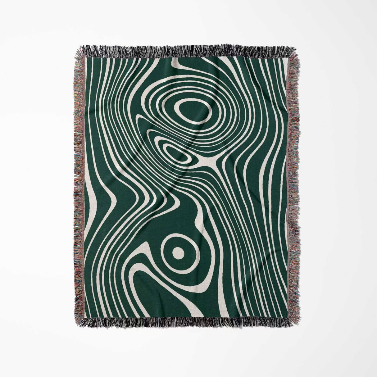 Forest green abstract woven throw blanket with fringe on a white background