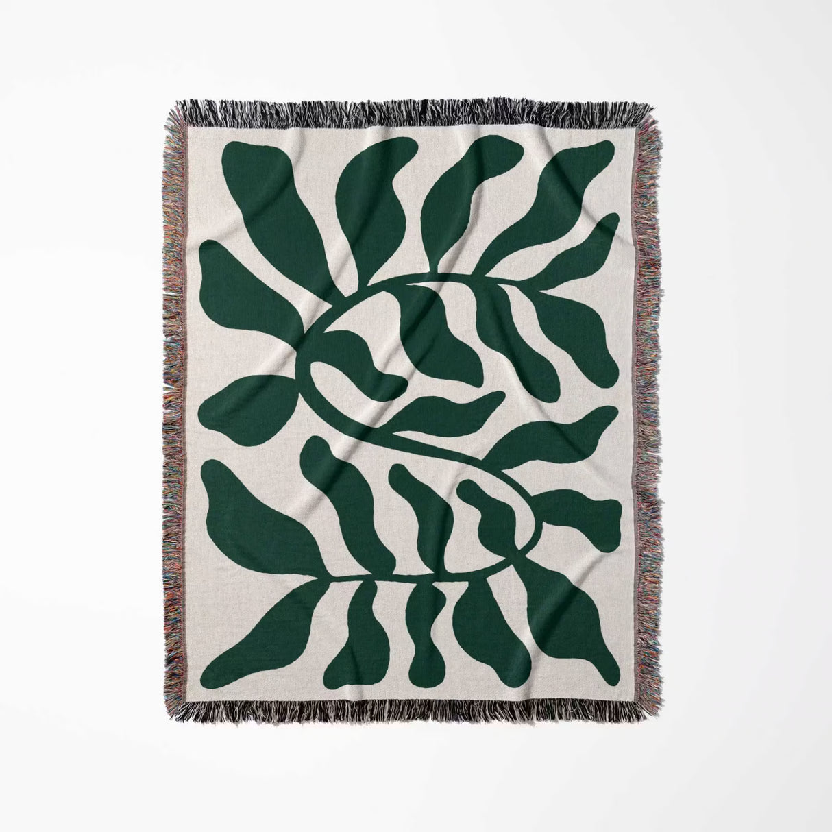 Forest green leaf Matisse throw blanket flat lay vertically with fringe on a white background