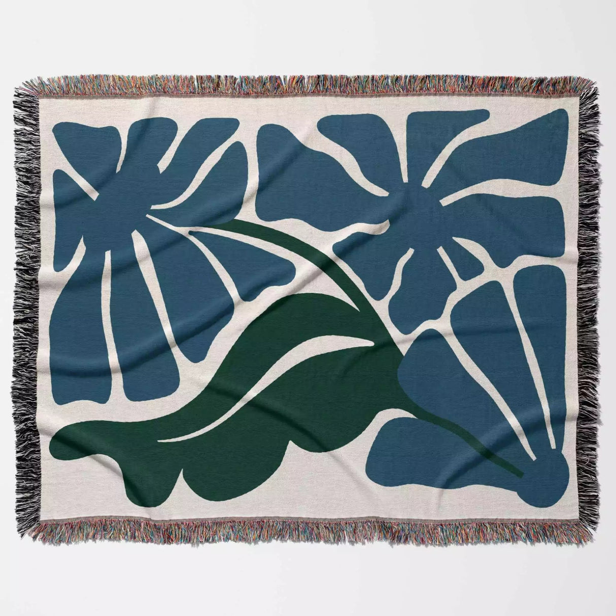 Decorative Henri Matisse blue flowers woven throw blanket with blue and green abstract leaf patterns on a beige background