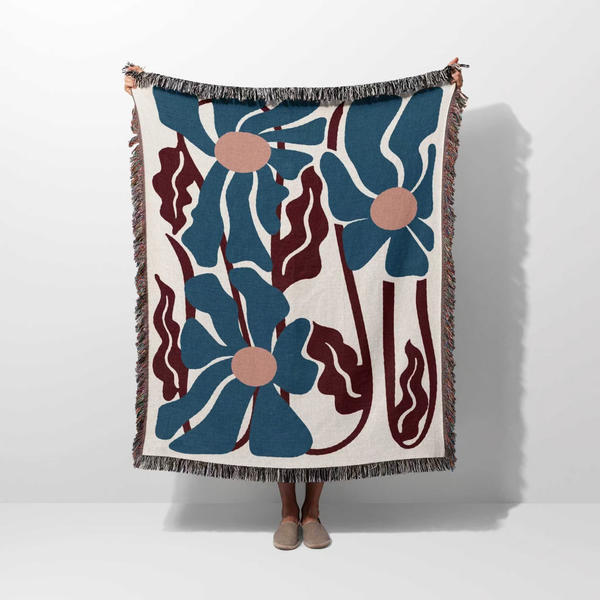 Matisse inspired blue and red tapestry throw blanket for couch on a white background