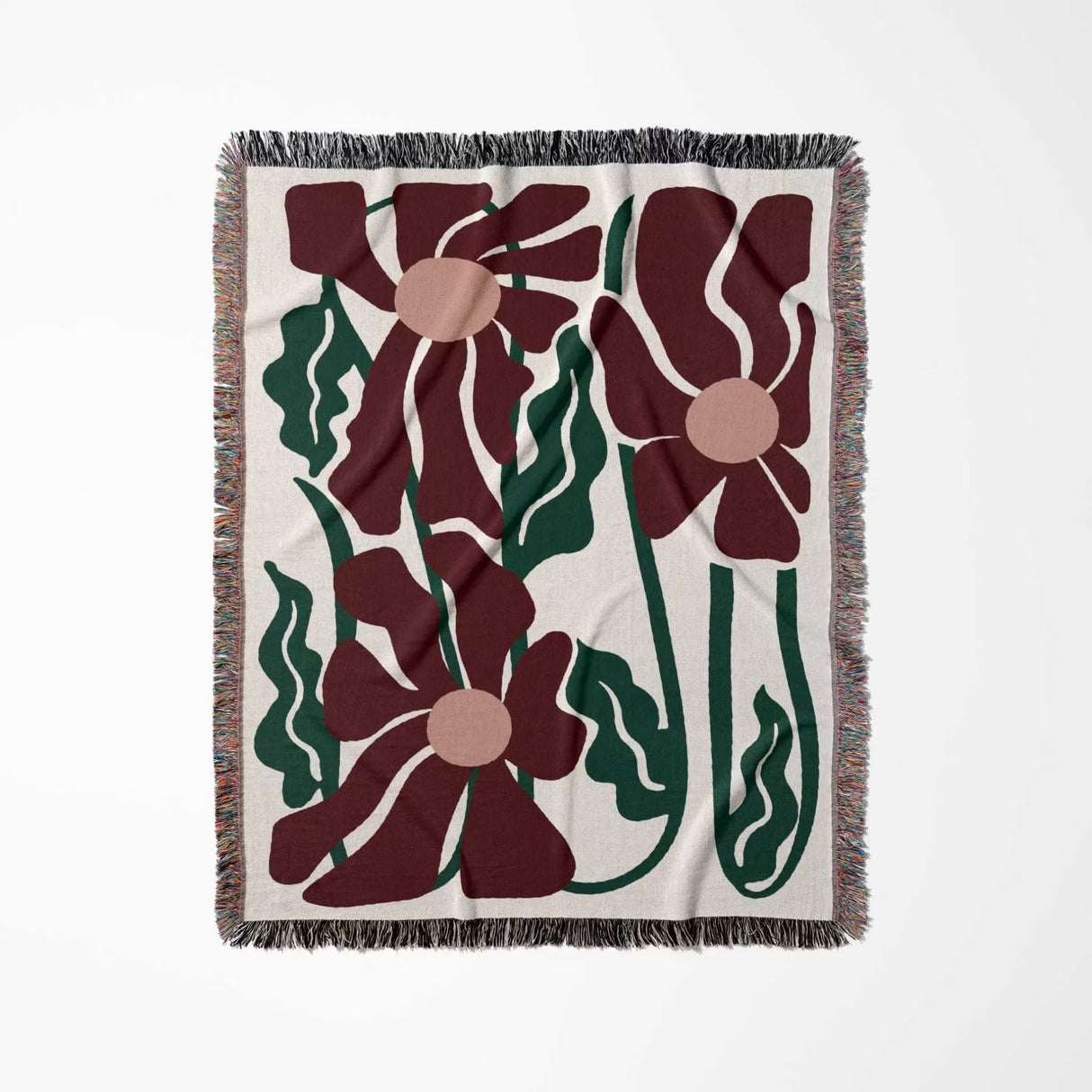 Floral patterned Matisse style blue pure cotton woven throw blanket with red and green flowers on a white background
