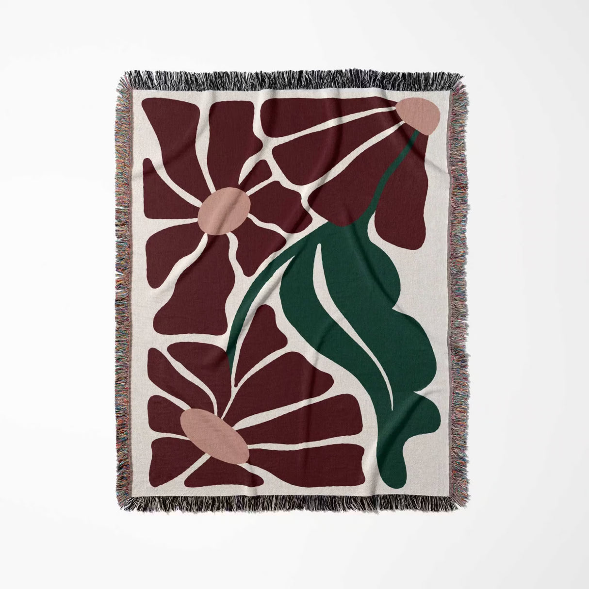 Floral patterned style botanical cotton woven throw blanket with red, green, and beige colors on a white background