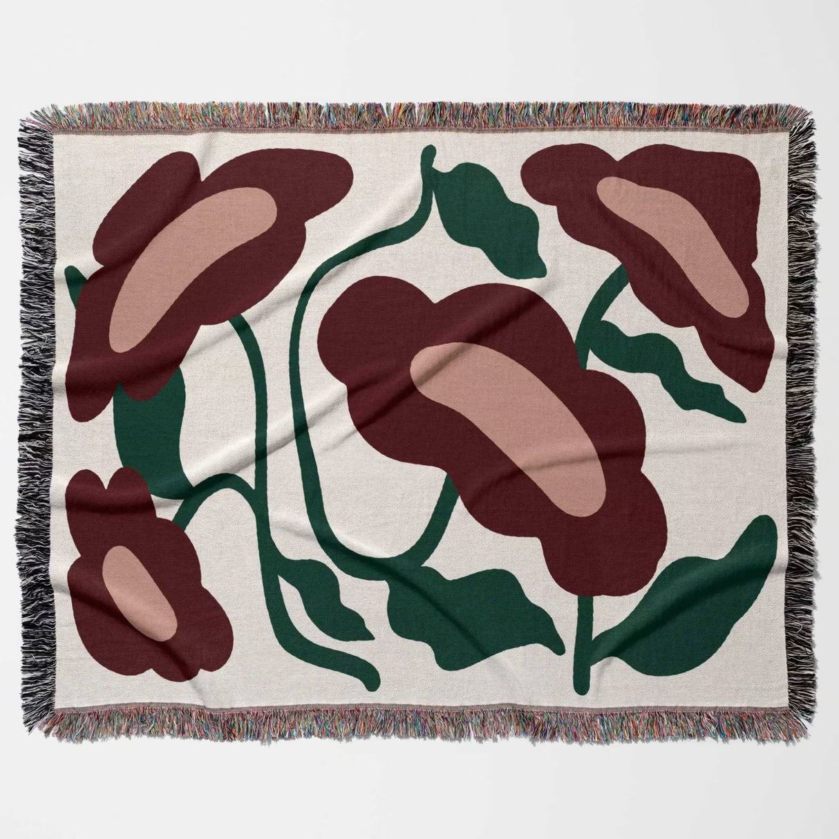 Floral patterned Matisse style red flowers cotton woven throw blanket with red and green flowers on a beige background
