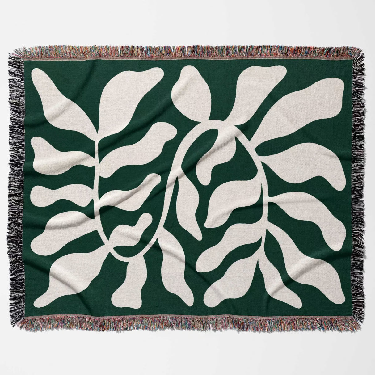 Matisse throw blanket green leaf abstract tapestry flat lay horizontally on a white background