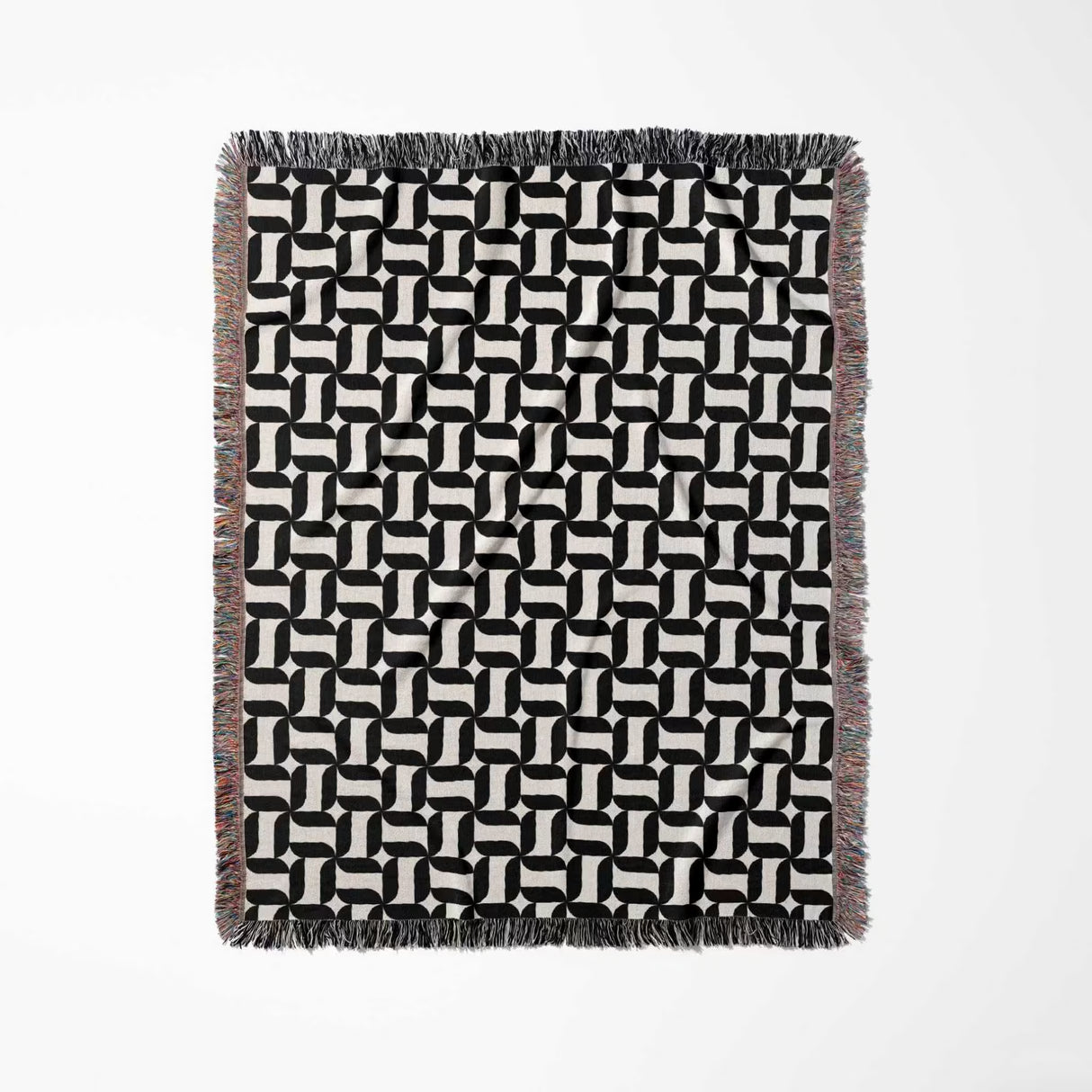 Black and white patterned geometric woven blanket throw tapestry with geometric design full view on a white background.