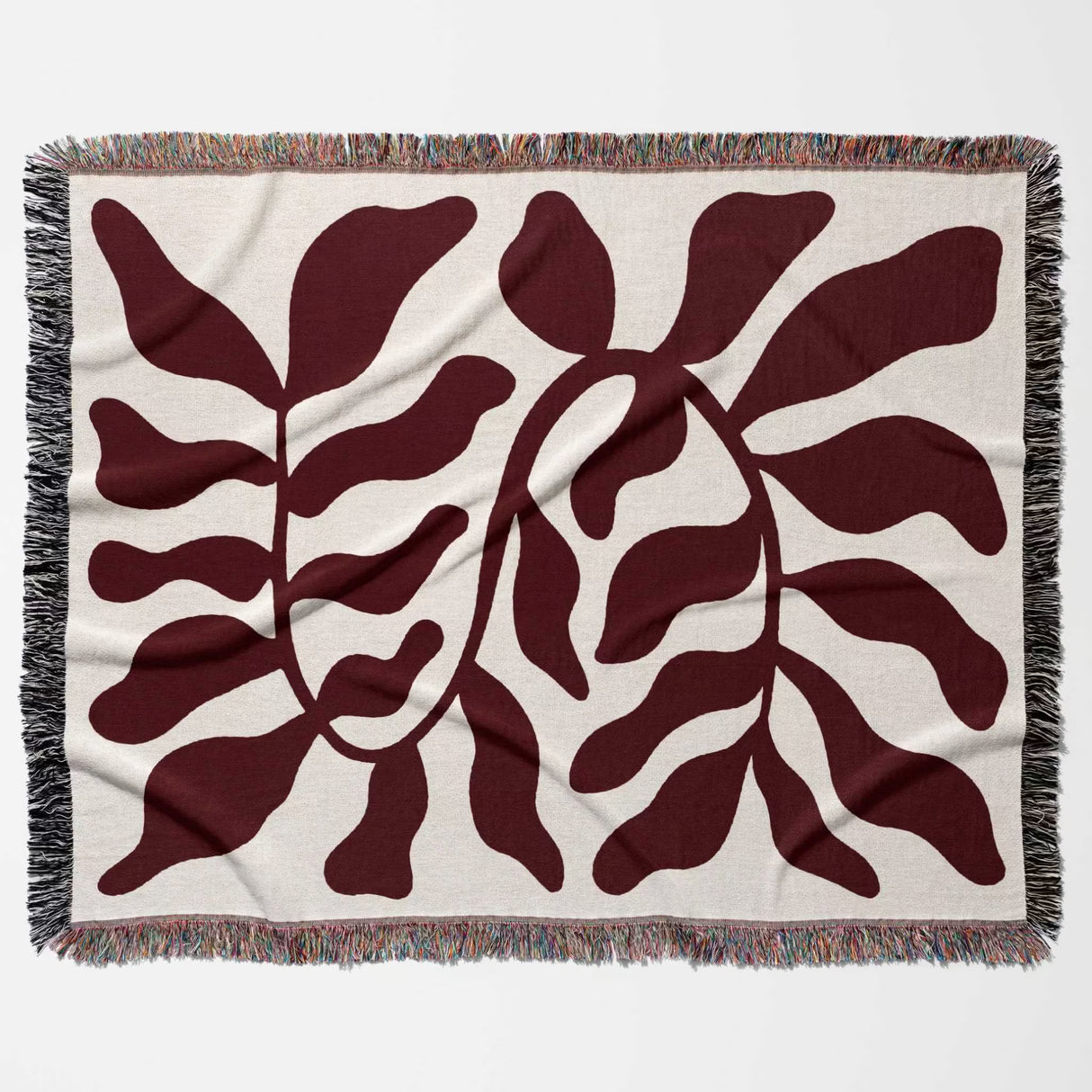 Red leaf Matisse throw blanket full flat lay view on a white background
