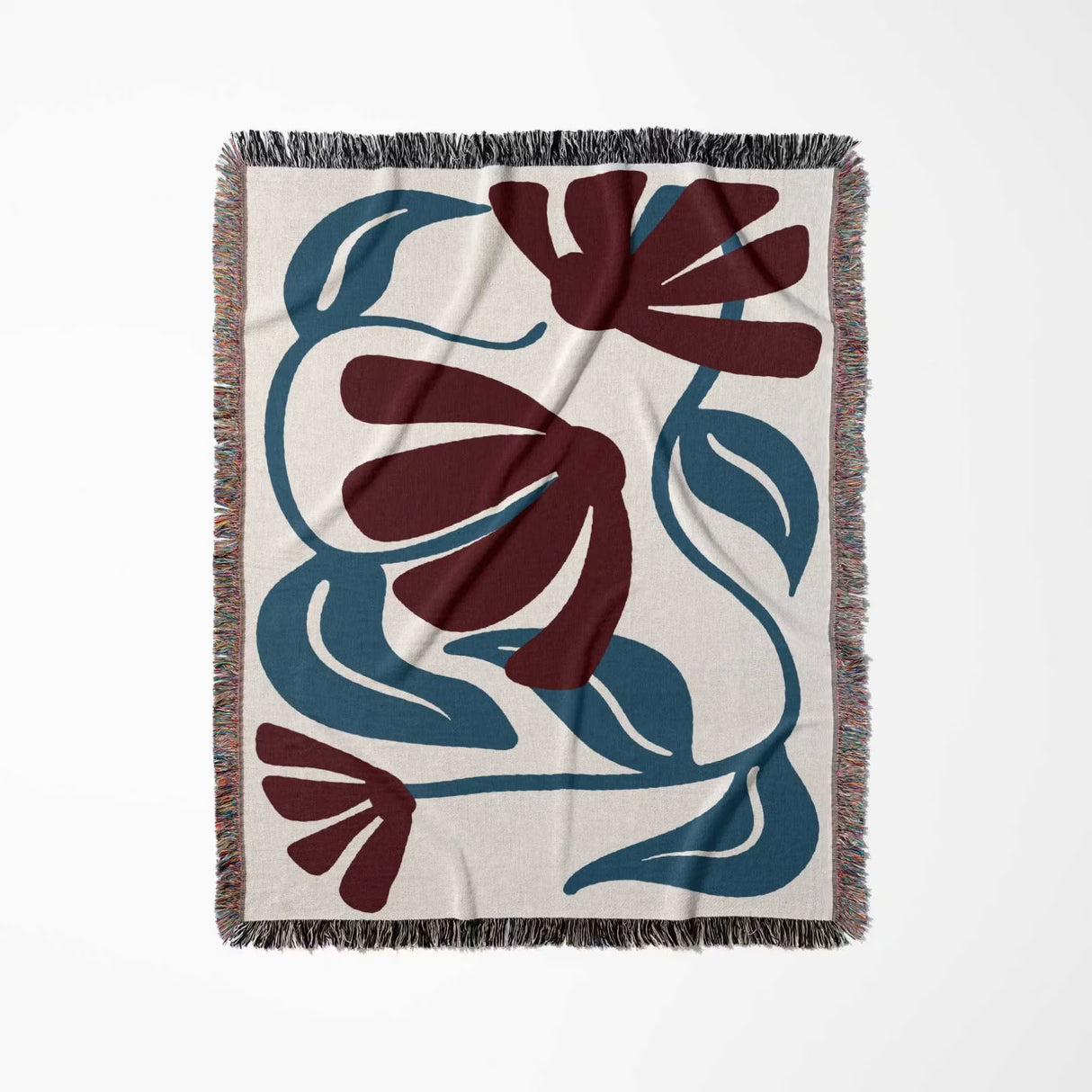 Floral patterned red and blue Matisse tapestry throw blanket with flowers on a beige background