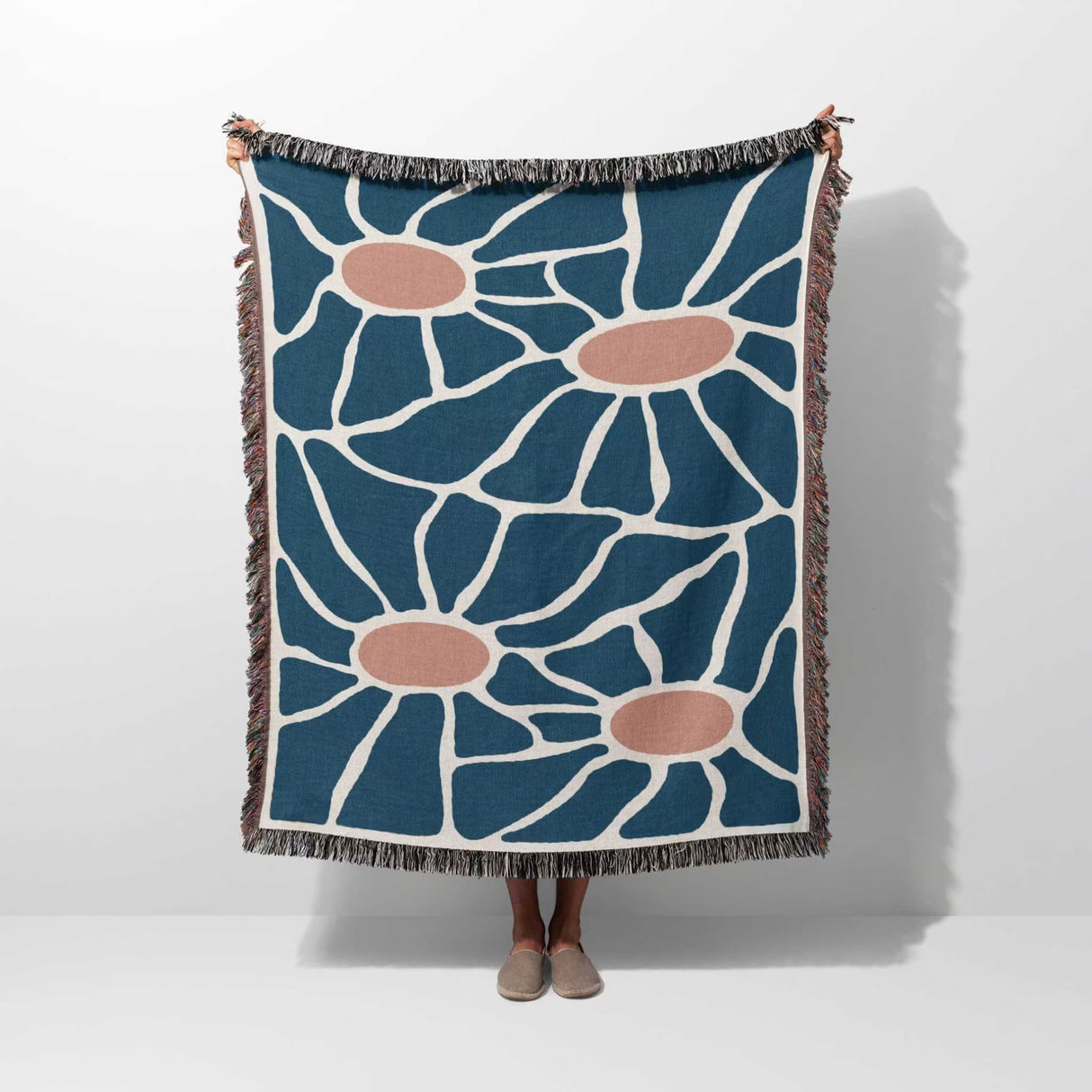 Retro style Matisse inspired tapestry throw blanket for couch with blue and red design on a white background