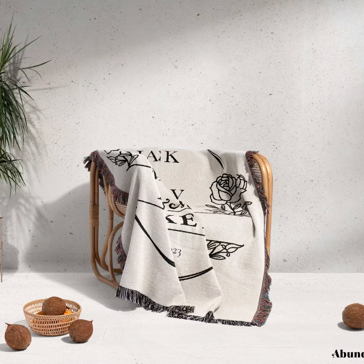 2 Year anniversary gift for wife and husband woven throw blanket with text and graphics draped over a chair on a light background