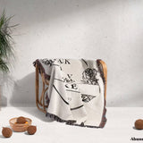 2 Year anniversary gift for wife and husband woven throw blanket with text and graphics draped over a chair on a light background