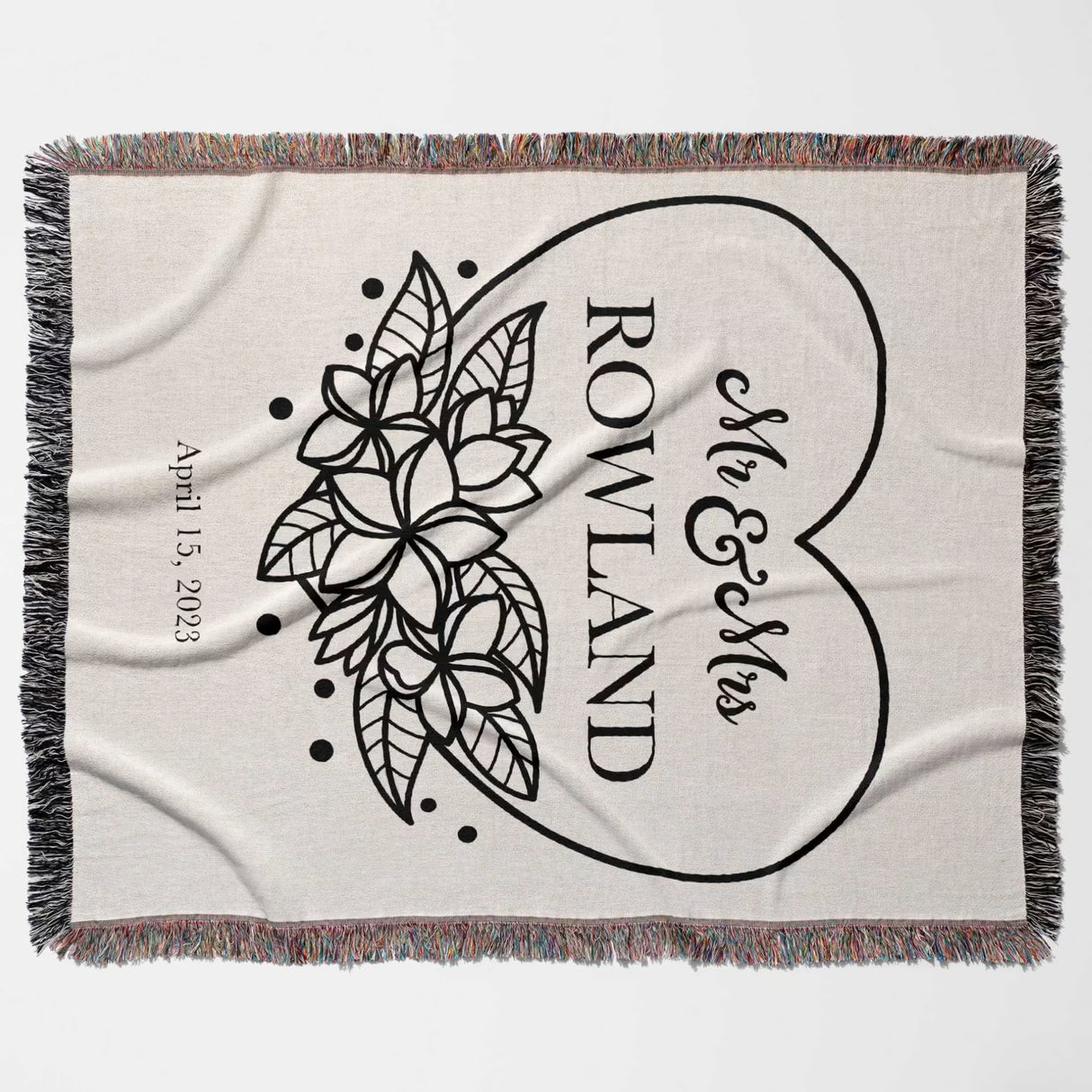 2nd year anniversary gift Mr and Mrs woven throw blanket with floral design and text 'Mr & Mrs Rowland' on a heart shape, dated April 15, 2023.