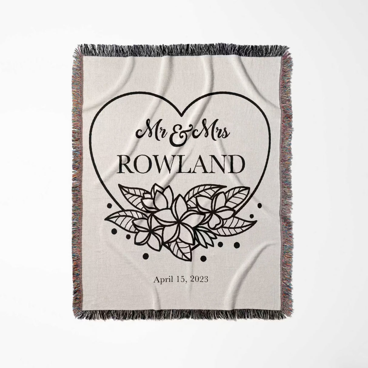 2nd year anniversary gift Mr and Mrs woven throw blanket with 'Mr & Mrs Rowland' and floral design full view on a light background