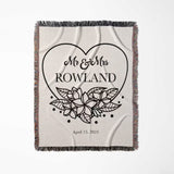 2nd year anniversary gift Mr and Mrs woven throw blanket with 'Mr & Mrs Rowland' and floral design full view on a light background