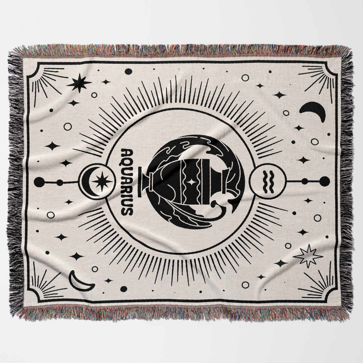 A flat, horizontal view of the Aquarius Zodiac Blanket, displaying its intricate design featuring the Aquarius symbol and celestial patterns, woven with black and off-white cotton yarns.