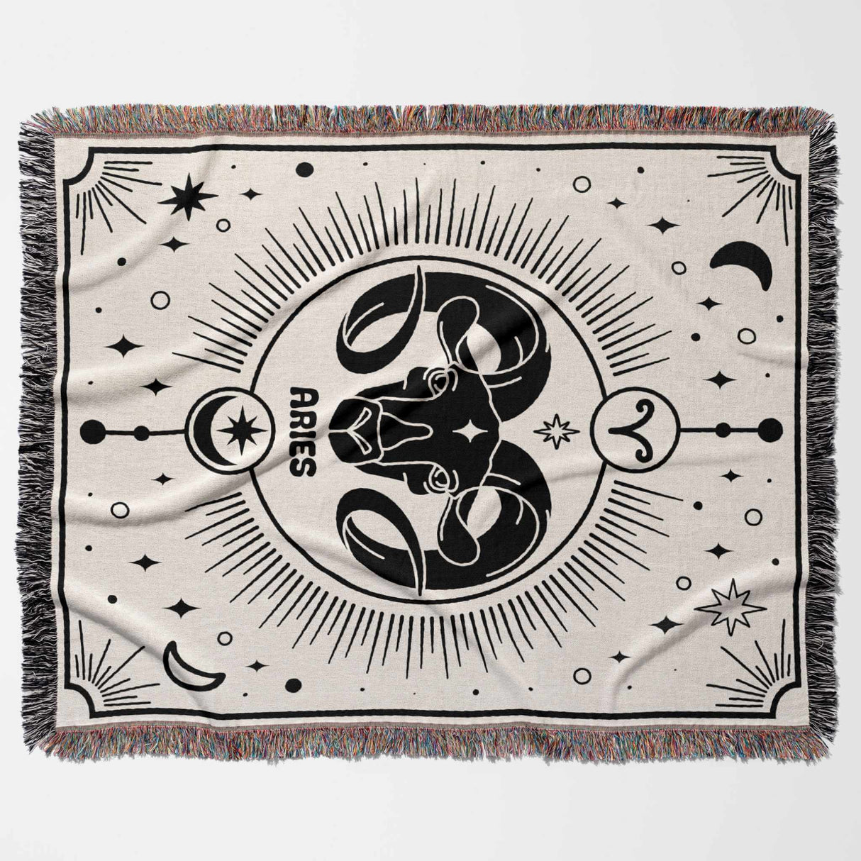 Displayed flat and horizontal, this Aries Zodiac Blanket features a striking ram design at its center, surrounded by celestial elements. The meticulous woven texture and multicolor fringe add to its charm, making it an ideal birthday gift for astrology enthusiasts.