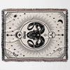 Displayed flat and horizontal, this Aries Zodiac Blanket features a striking ram design at its center, surrounded by celestial elements. The meticulous woven texture and multicolor fringe add to its charm, making it an ideal birthday gift for astrology enthusiasts.