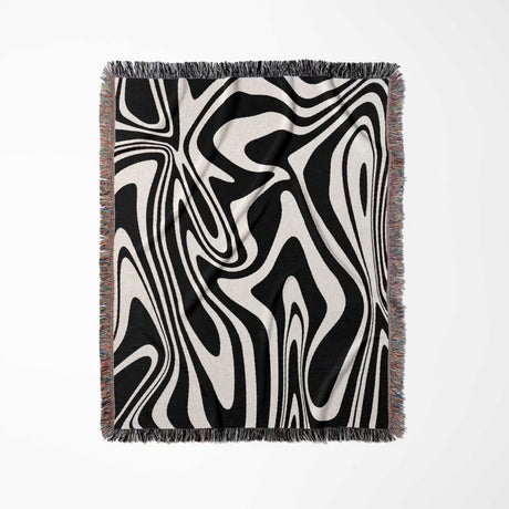 Black and white marble woven throw blanket for couch with black and white design on a white background