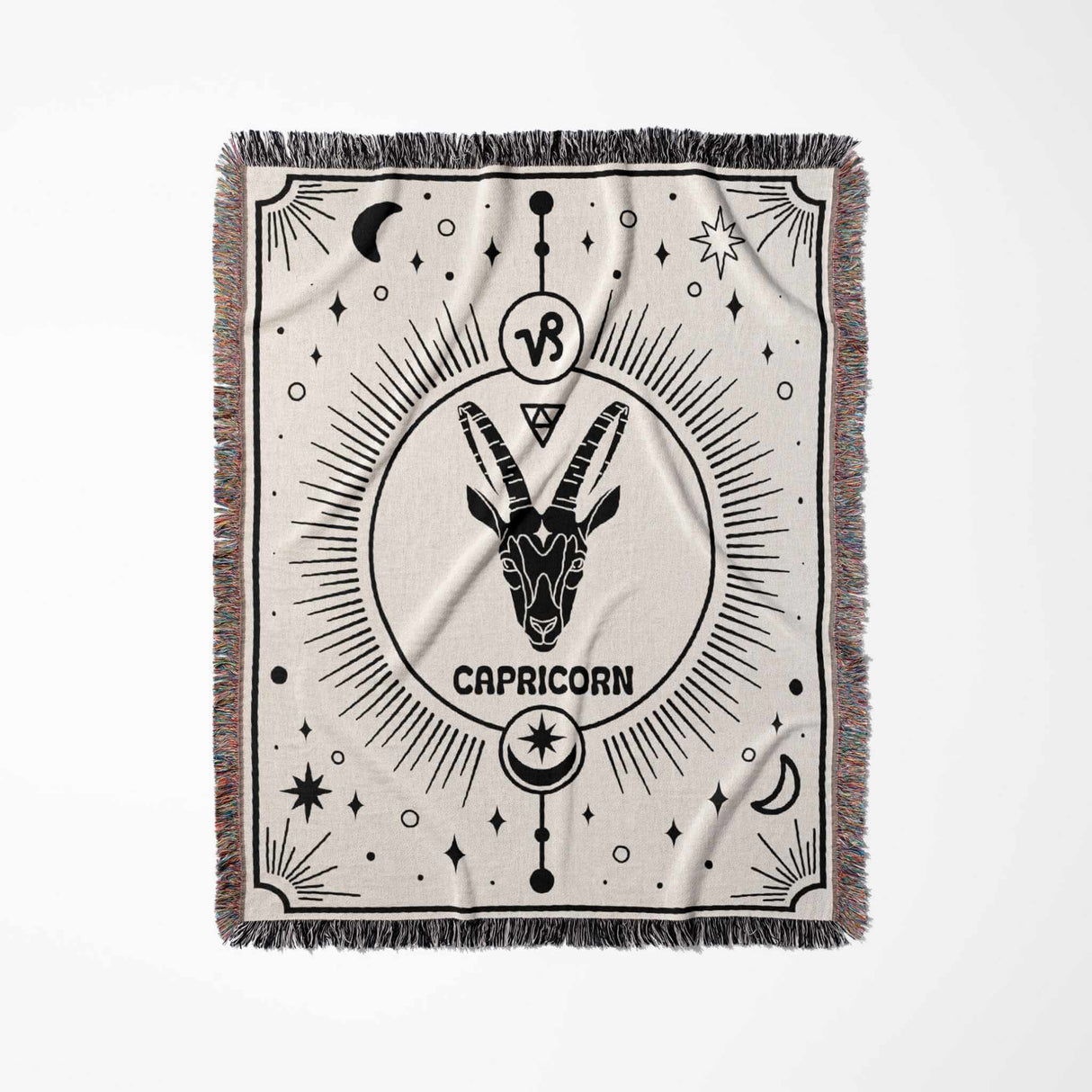 A vertical shot of the Capricorn Zodiac Blanket, showcasing the detailed Capricorn symbol and starry design. This intricately woven throw is an exceptional birthday gift idea for astrology enthusiasts and can be used as a tapestry or cozy throw blanket.