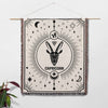 The Capricorn Zodiac Blanket displayed as a wall hanging, demonstrating its dual functionality as both a decorative tapestry and a cozy throw. This makes a unique birthday gift idea for women and men who appreciate versatile and stylish home decor items.