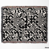 Black and white classical checker board pattern woven blanket throw full view on a white background.