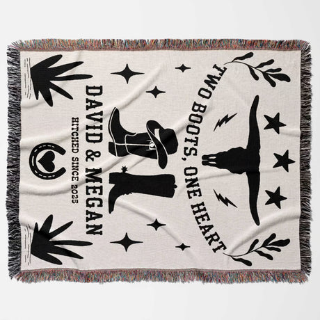Cow skull and boots cotton anniversary gift woven throw blanket blanket flat lay with black graphics and text on a white background