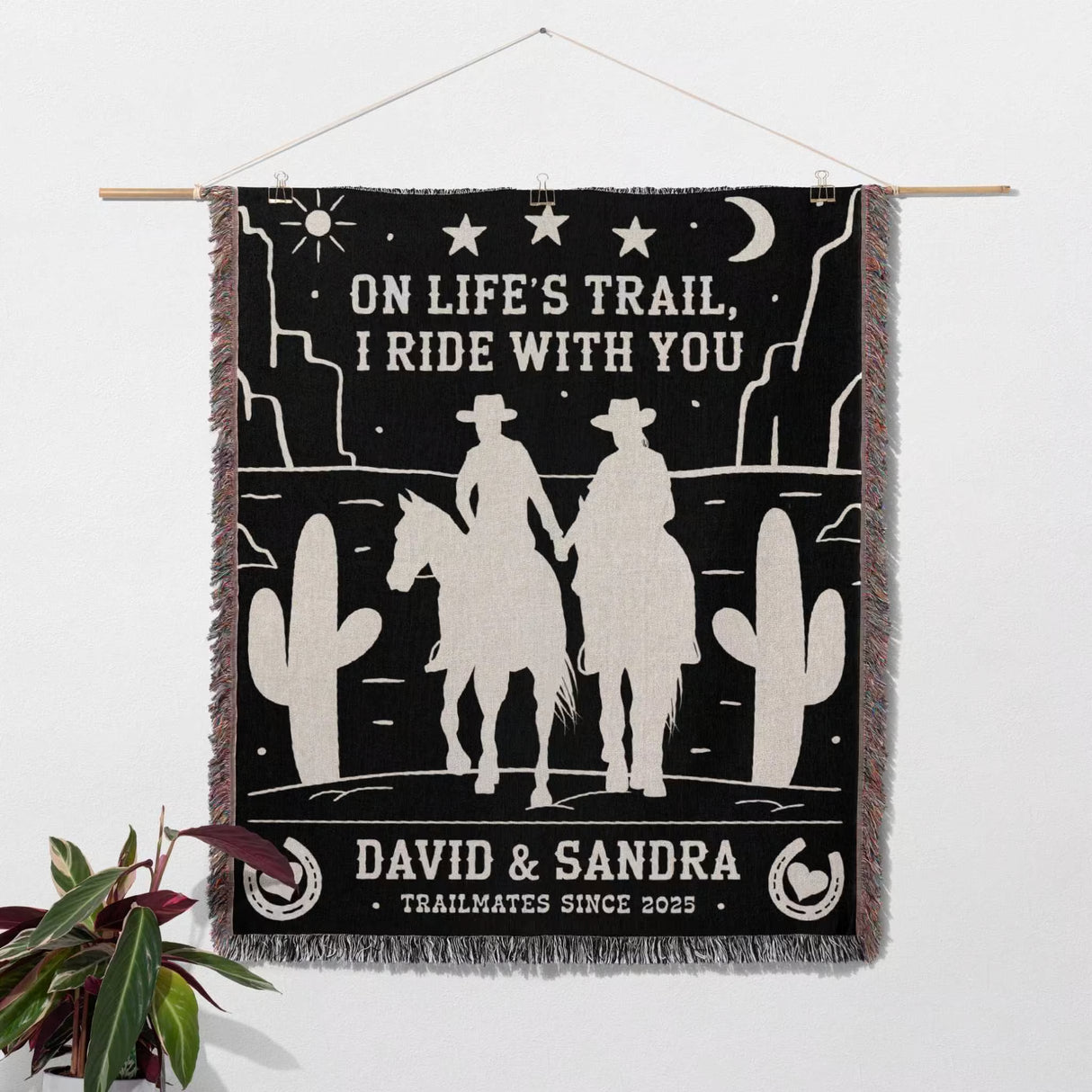 Cowboy and cowgirl 2nd anniversary gift woven throw blanket with cowboy design and personalized text on a white background as a wall tapestry