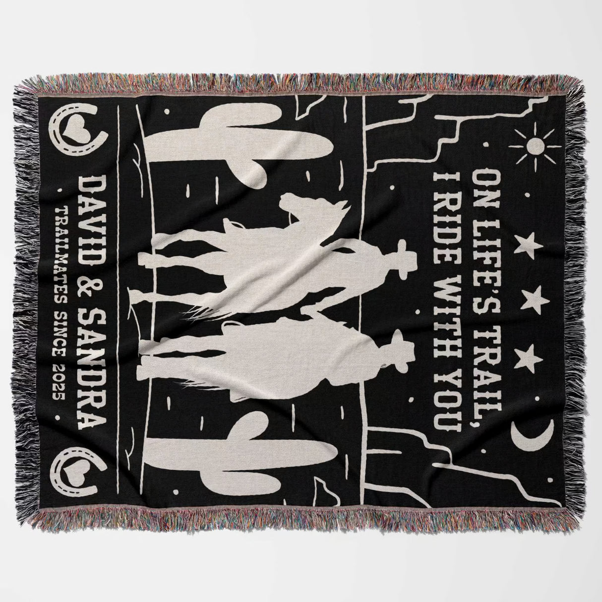 Cowboy and cowgirl 2nd anniversary gift woven throw blanket flat lay with horse and cactus design, featuring text 'On Life's Trail, I Ride With You' and personalized names.