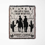 Cowboy and cowgirl cotton anniversary gift woven throw blanket full view with cowboy design and text on a white background