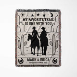 Cowboy and cowgirl couple cotton anniversary gift woven throw blanket full view with cowboy design and text on a white background