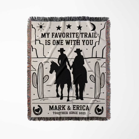 Cowboy and cowgirl couple cotton anniversary gift woven throw blanket full view with cowboy design and text on a white background