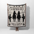 Cowboy and cowgirl on two horses cotton anniversary gift woven throw blanket held by a person with cowboy design and text 'My favorite trail is one with you' by Paul & Caitlin