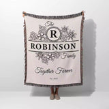 Custom last name cotton blanket with 'The Robinson Family Together Forever' text and floral design on a white background