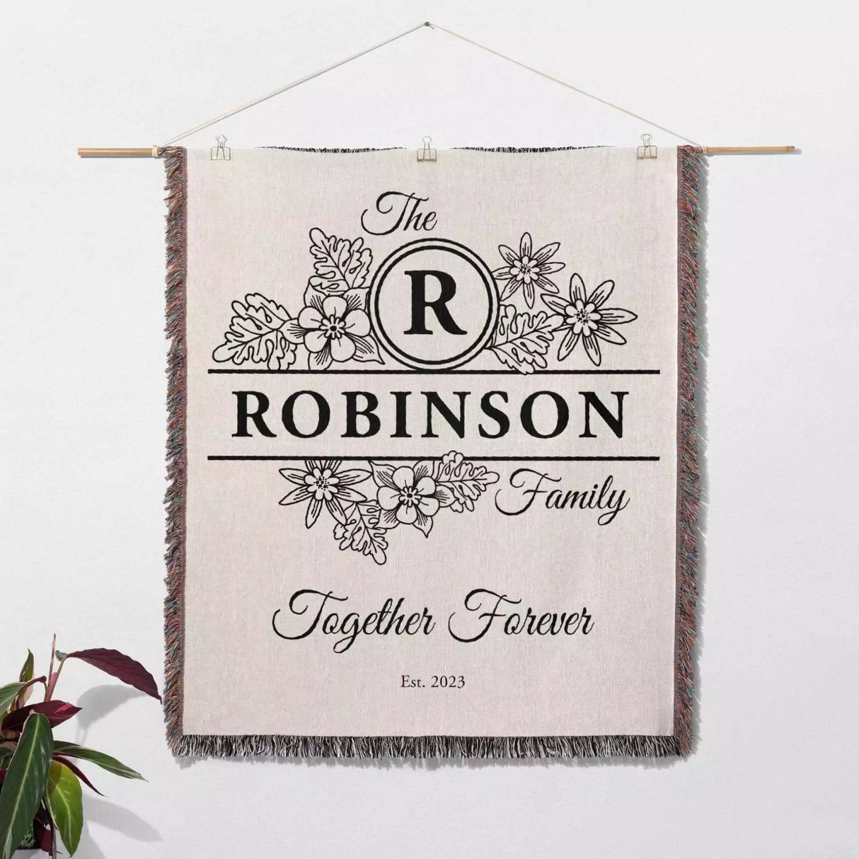 Custom last name cotton blanket wall hanging 'The Robinson Family Together Forever' text on a white background