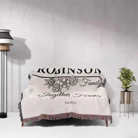 Custom last name cotton blanket with 'Robinson Family Together Forever Est. 2023' text on a white background