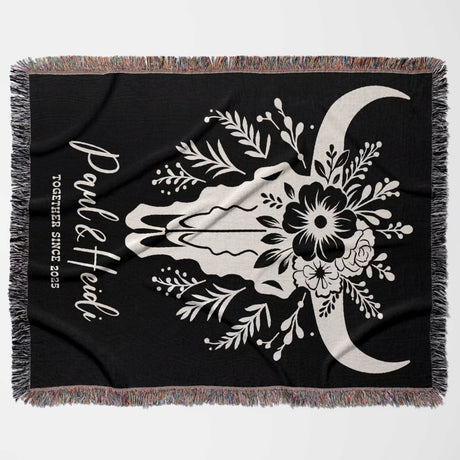 Floral cow skull 2nd anniversary gift woven throw blanket flat lay with white floral design and text on a white background