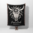 Floral cow skull 2nd anniversary gift woven throw blanket with white bull skull design and custom text held by a person on a white background