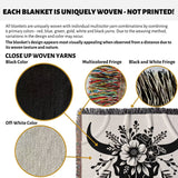 Floral cow skull cotton anniversary gift woven throw blanket with floral design and close-up details of woven yarns and fringes.