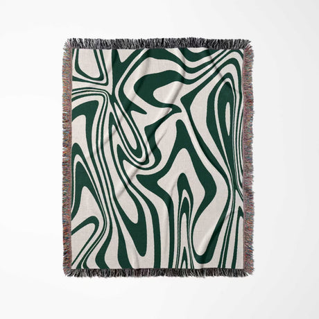 Abstract patterned forest green marble woven throw blanket for couch with green and white design on a white background