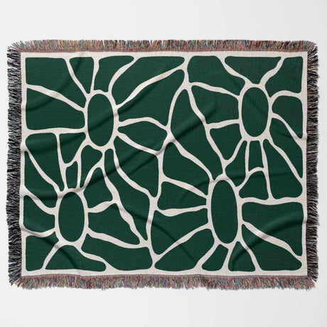 Forest green Matisse tapestry throw blanket for couch with fringe horizontally flat on a white background