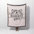 Last name monogram blanket with 'The Roberts Family' design on a white background
