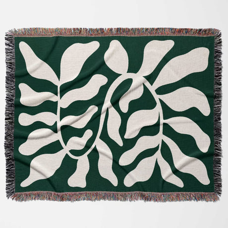 Matisse throw blanket green leaf abstract tapestry flat lay horizontally  on a white background